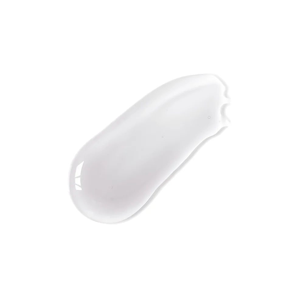 Milky white lip gloss swatch in a smooth teardrop shape.